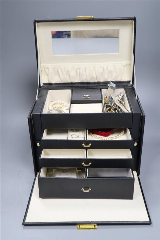 A quantity of costume jewellery some in silver, in a case and a box.